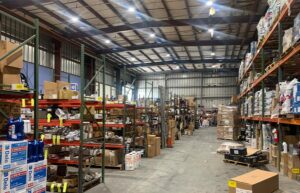 Warehouse with lighting by a commercial electrician in Boynton Beach, FL