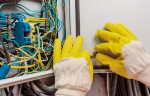 Electrical contractor working on wires and other electrical services in Hobe Sound, FL