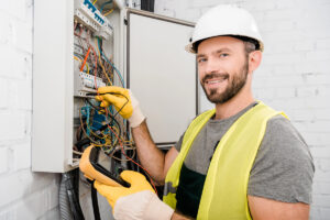 Residential electrician working on a breaker panel in Boynton Beach, FL 