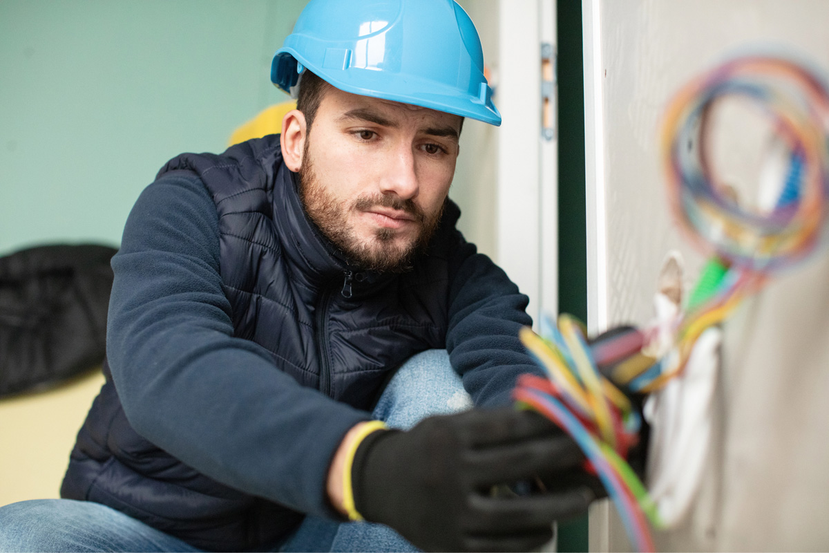 technician providing Residential Electrician services in Palm Beach Gardens, FL